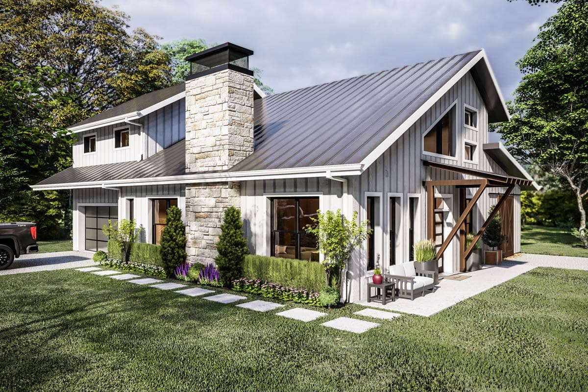 House plan exterior: Modern Farmhouse style, two stories, metal roof, prominent stone chimney, and a two-car garage.