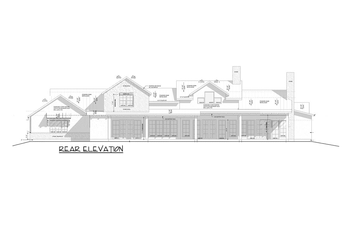 Rear elevation of a house plan featuring stone walls, standing seam metal roofs, large windows, and multiple French doors.