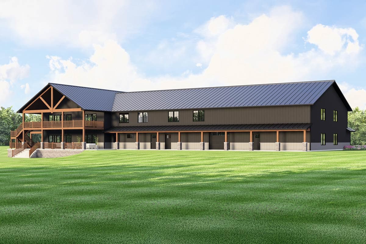 Modern house plan exterior with a dark metal roof, multiple levels, and a wrap-around porch supported by stone-clad columns.