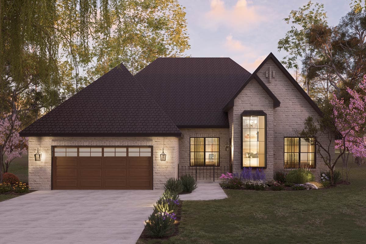 House plan exterior. Two-story home with a brick facade. Features include a front-facing garage, gabled roof, and a large arched window.