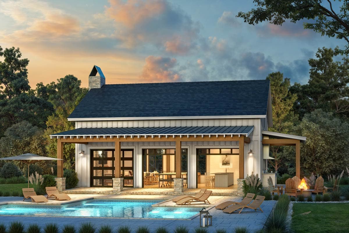 Modern Farmhouse house plan exterior with covered porch, gables, stone chimney, and large glass doors opening to a pool.