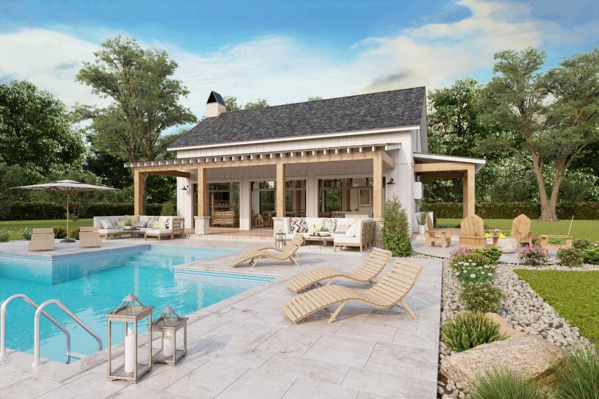 Modern Farmhouse style house exterior with covered patio, pool, and outdoor seating area.