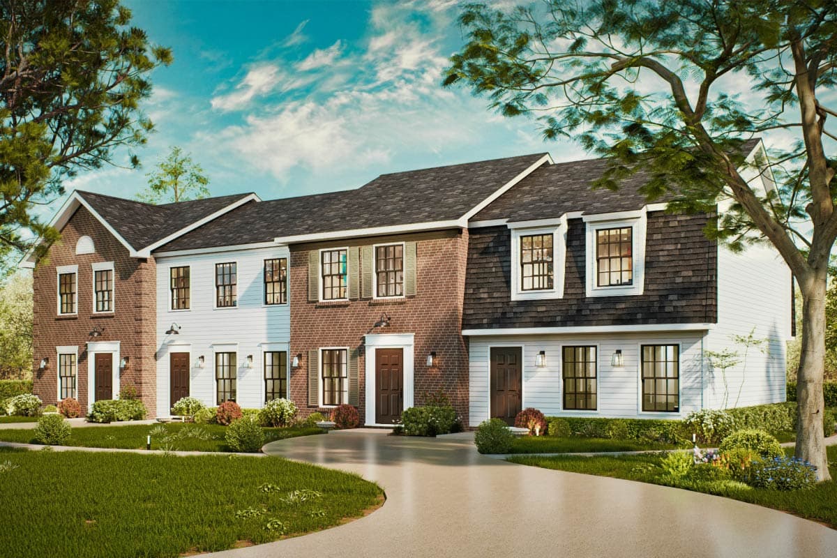 House plan exterior showcasing three-story townhomes with brick, white siding, and shingle facades, pitched roofs, and multiple gables.