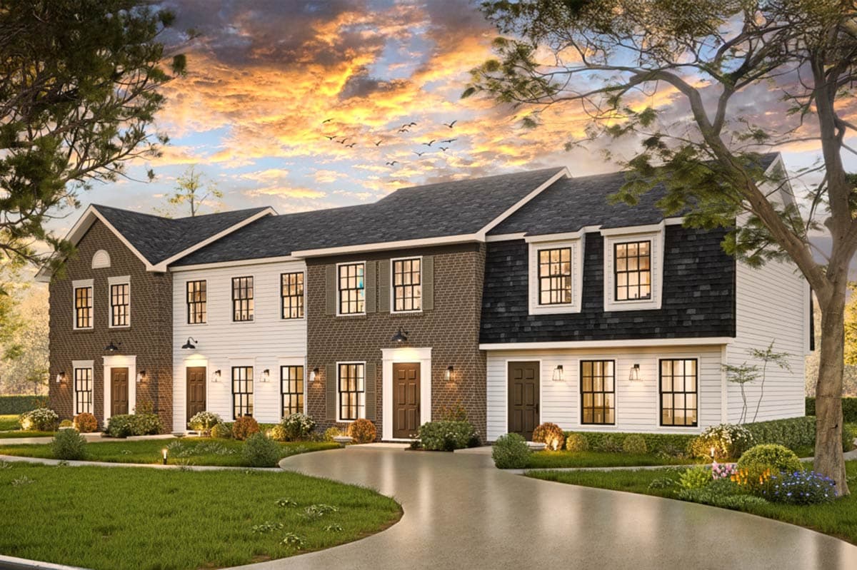 House plan exterior: two-story townhomes with brick and siding, dormers, and pitched rooflines.