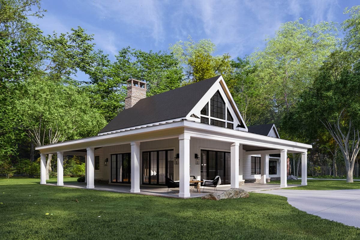 House plan exterior: Modern Farmhouse style, one story, with a wrap-around porch, stone chimney, and prominent gable.