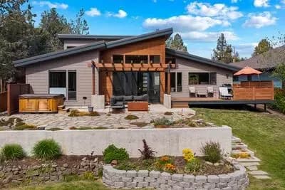 Modern Mountain House Plan with Vaulted Ceilings and Private Guest Room