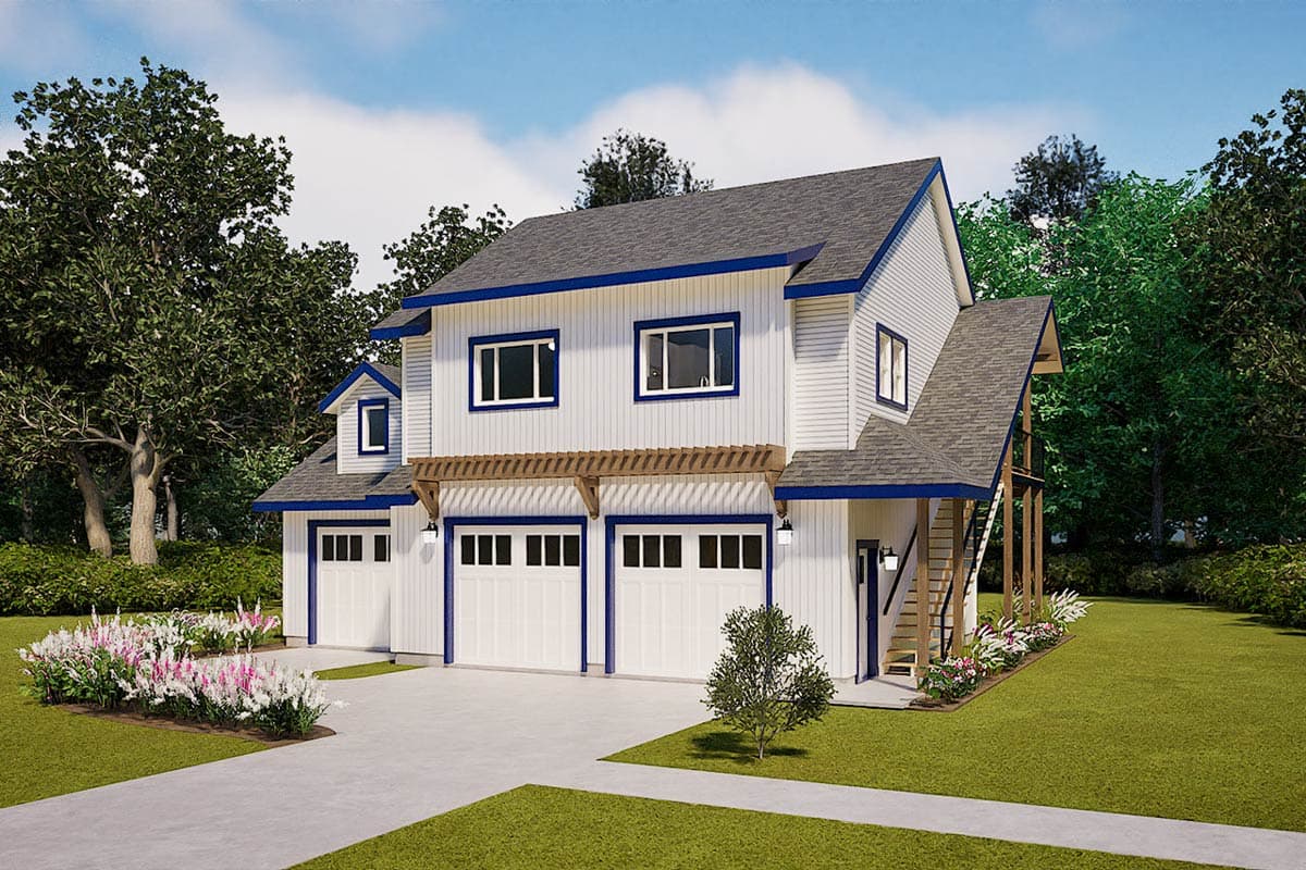 A modern white house with blue trim features multiple garage doors and a balcony. Landscaping surrounds the house on a sunny day.