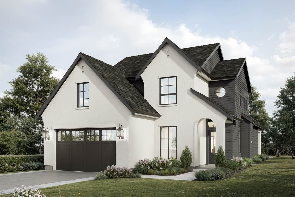 House plan exterior. Two-story with gabled roof, arched entryway, and dark-colored garage door. Features include a round window and dark siding.