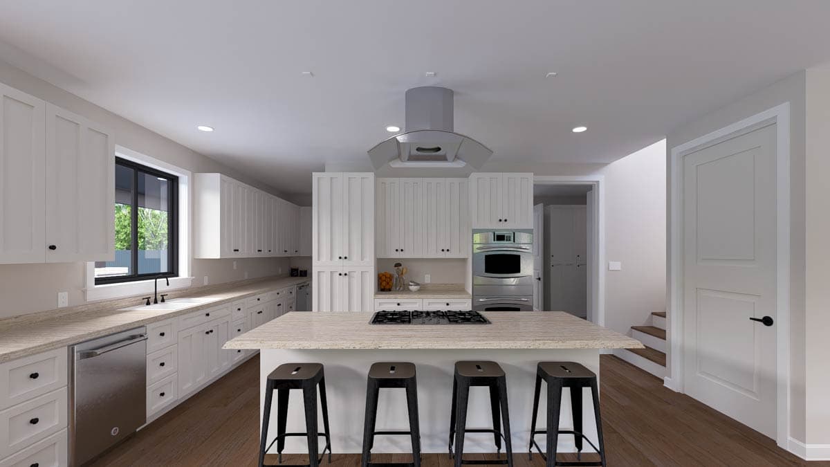 Modern kitchen with island, white shaker cabinets, stainless steel appliances, and gas range.