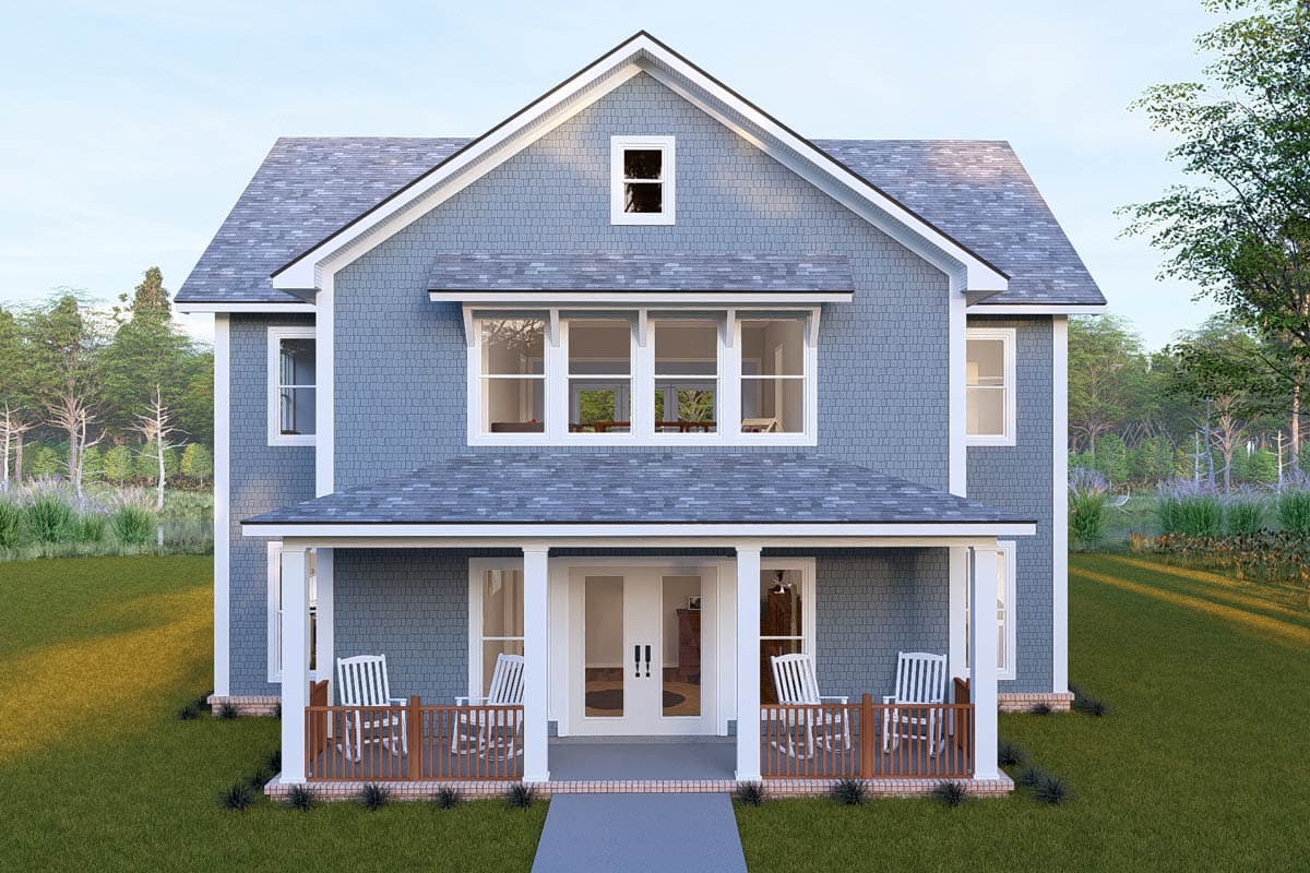 House plan exterior. Two-story Craftsman home with front porch, gabled roof, and dormer window. Features wood shake siding and decorative trim.