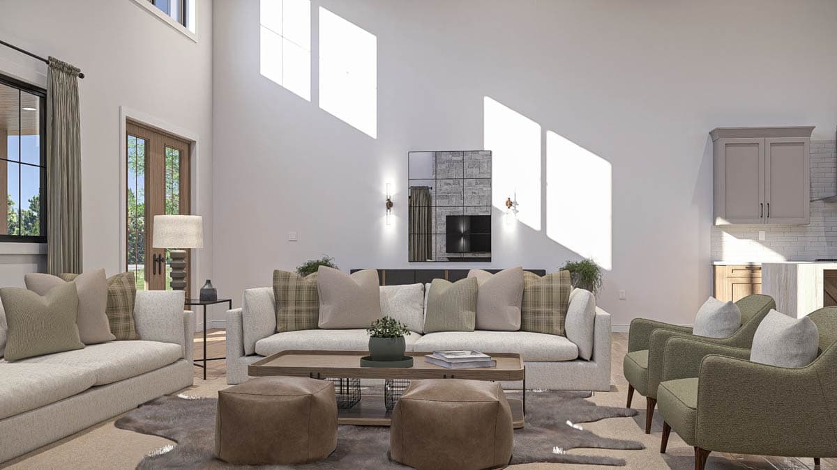 Interior rendering of a great room with a vaulted ceiling, fireplace, and open layout to the kitchen.