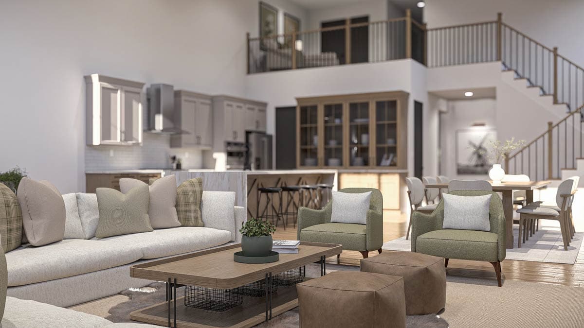 Open concept living space with kitchen, dining area, and living room. Features a kitchen island, vaulted ceiling, and staircase.