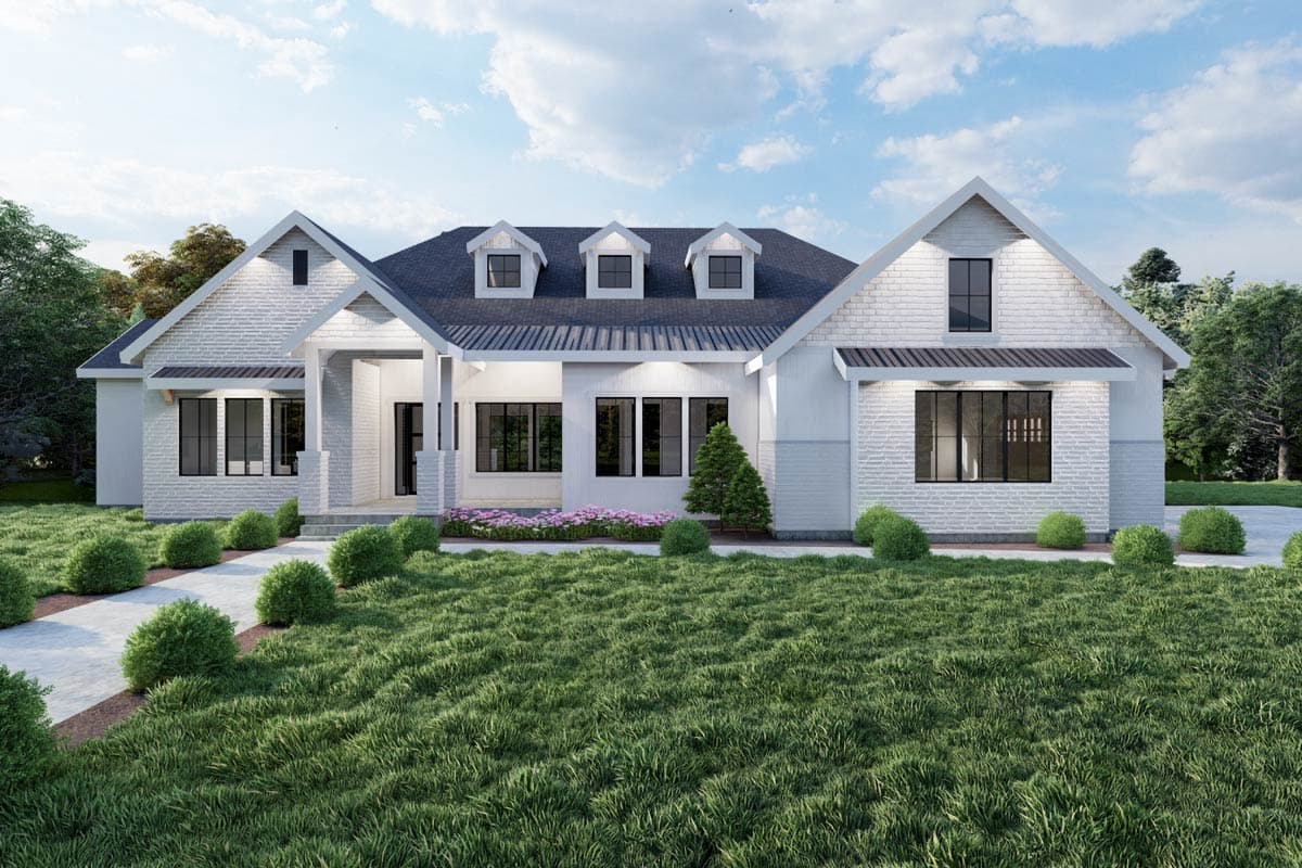 House plan exterior featuring a farmhouse style with gabled roof, dormers, and a covered front porch. One-story home with brick accents.