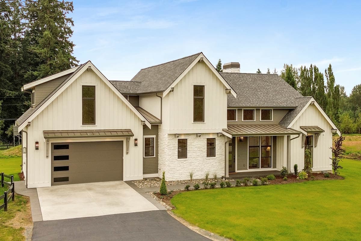 Modern Farmhouse house plan exterior with a side-entry garage, gabled dormers, board-and-batten siding, and stone accents.