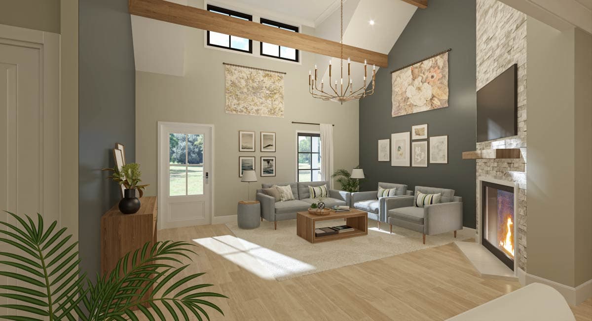 Living room with vaulted ceiling, exposed beams, stone fireplace, and large windows.