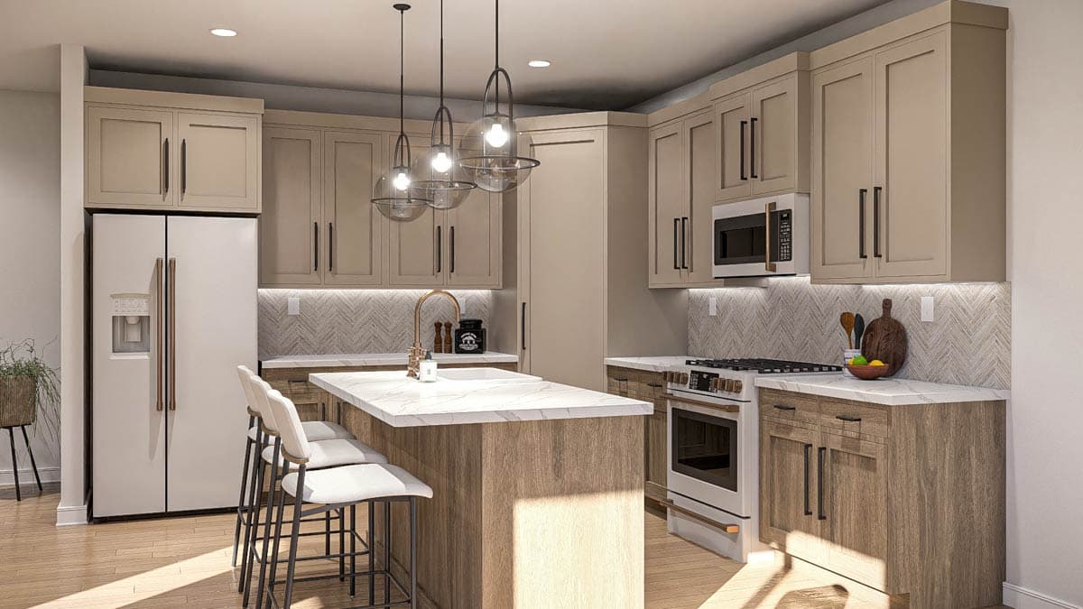 Kitchen with island, white marble countertops, light wood cabinets, stainless steel appliances, and pendant lights.