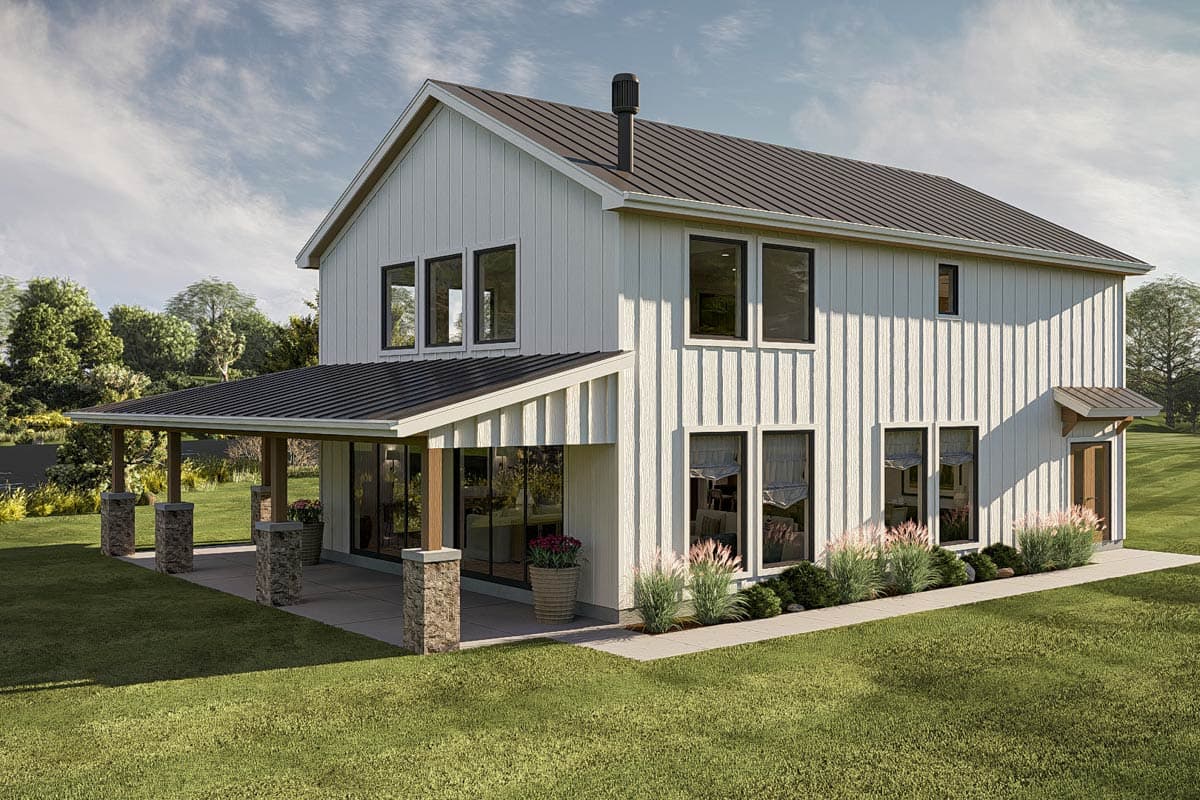 House plan exterior. Two-story Modern Farmhouse with a covered porch supported by stone columns, metal roof, and gabled roofline.