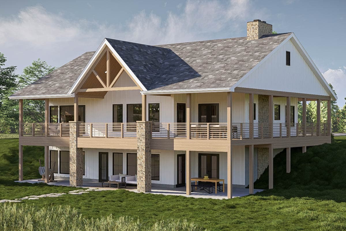 Modern Farmhouse house plan exterior with wrap-around deck, stone accents, exposed rafter tails, and gabled roof.