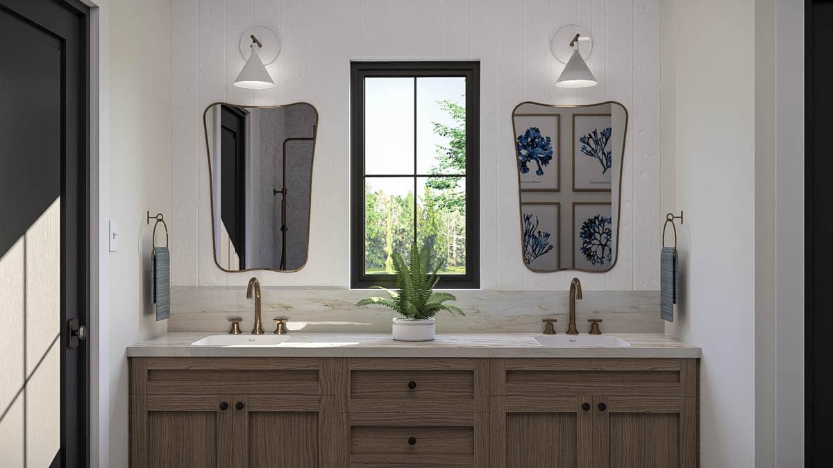 Bathroom vanity with double sinks, wood cabinetry, marble countertop, and a large window with natural light.