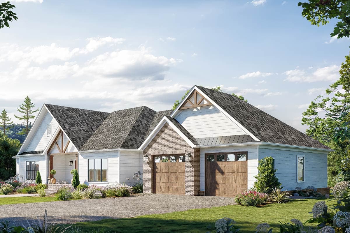 Modern Farmhouse house plan exterior with white siding, brick accents, a covered porch, and a three-car garage.