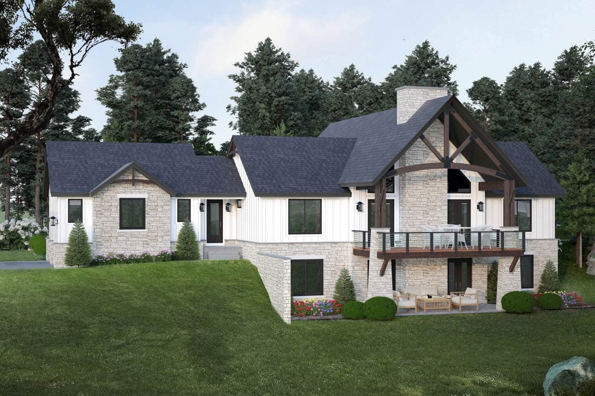 House plan exterior with two stories, stone and white siding, and a timber framed gable over a balcony.