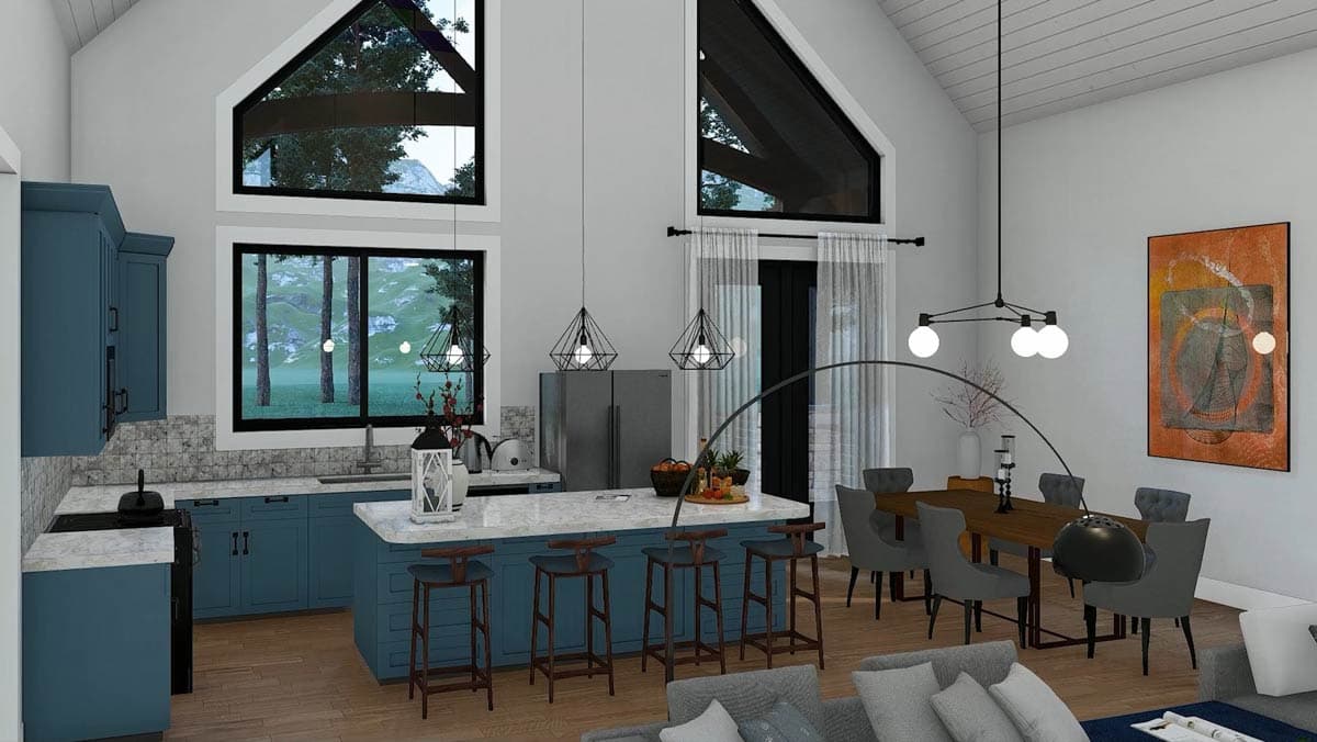 Open concept kitchen and dining area with vaulted ceilings, a large island, and a modern dining table.