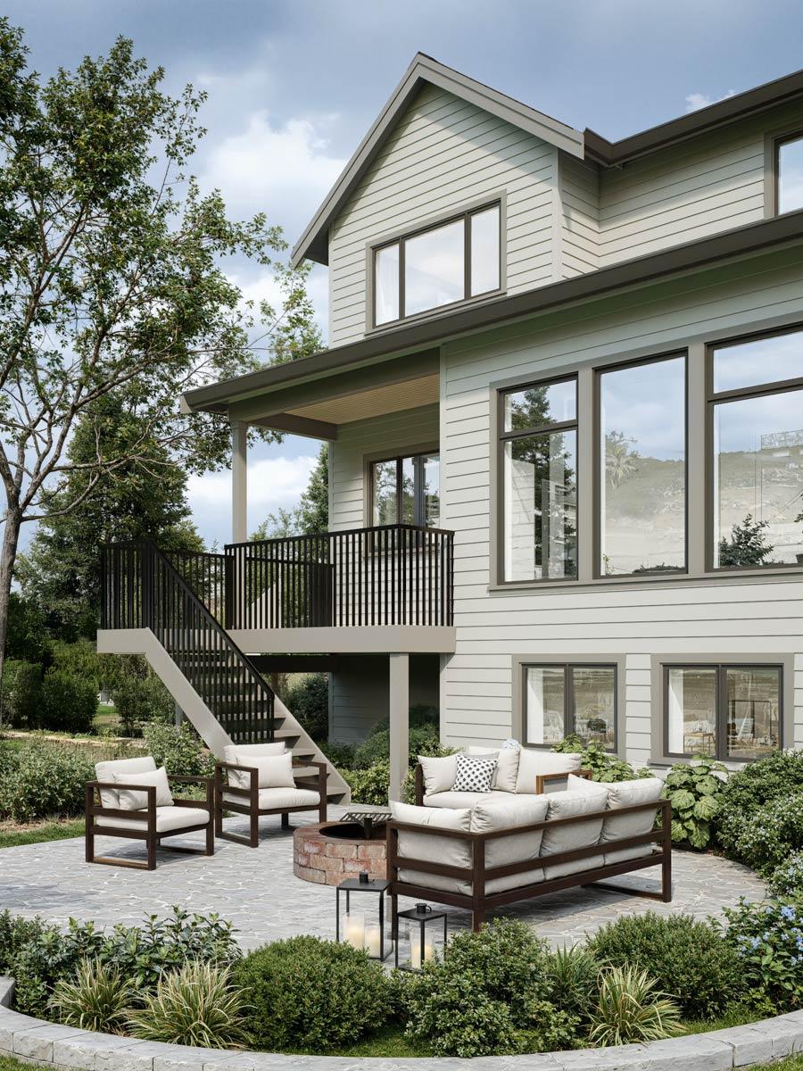 House plan exterior: two-story modern home with gabled roof, wide lap siding, and an elevated deck with stairs.