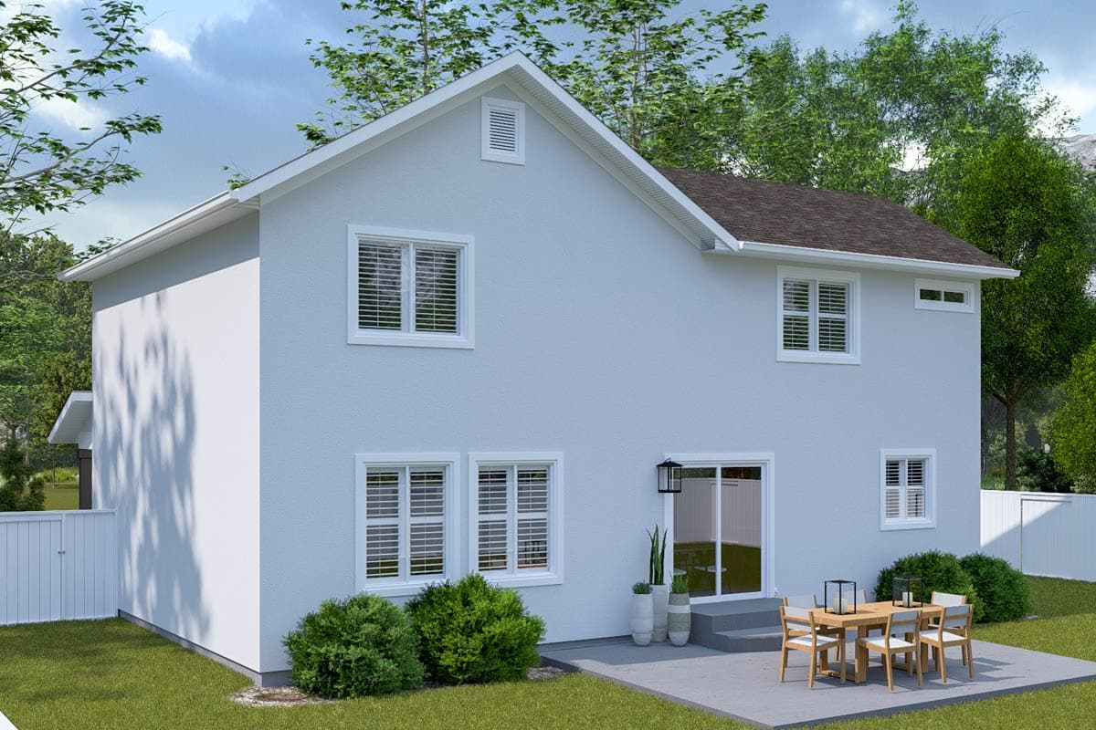 Two-story house plan exterior with a gable vent, white-framed windows, and a sliding glass door leading to a patio.