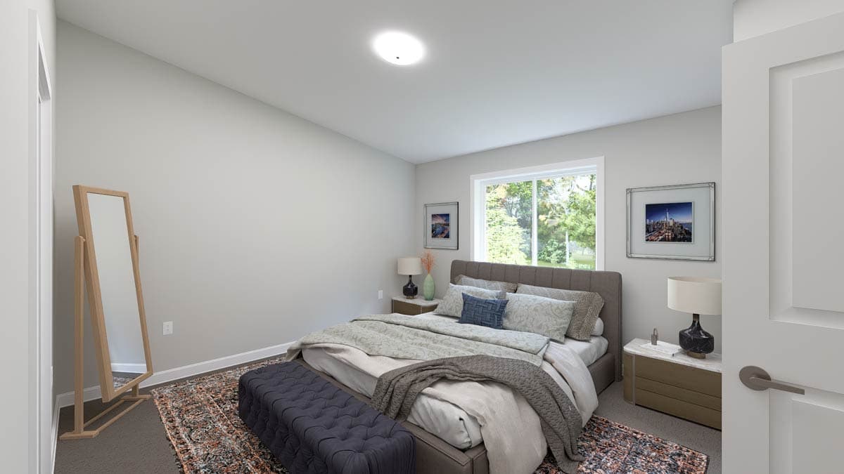 Bedroom with queen bed, tufted bench, large window, full-length mirror, and patterned rug.