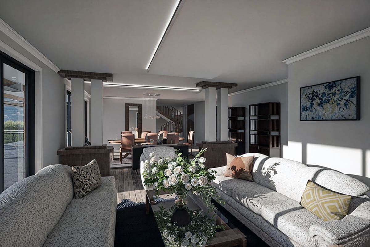 Interior rendering of a great room with sofas, dining table, staircase, and decorative shelving.