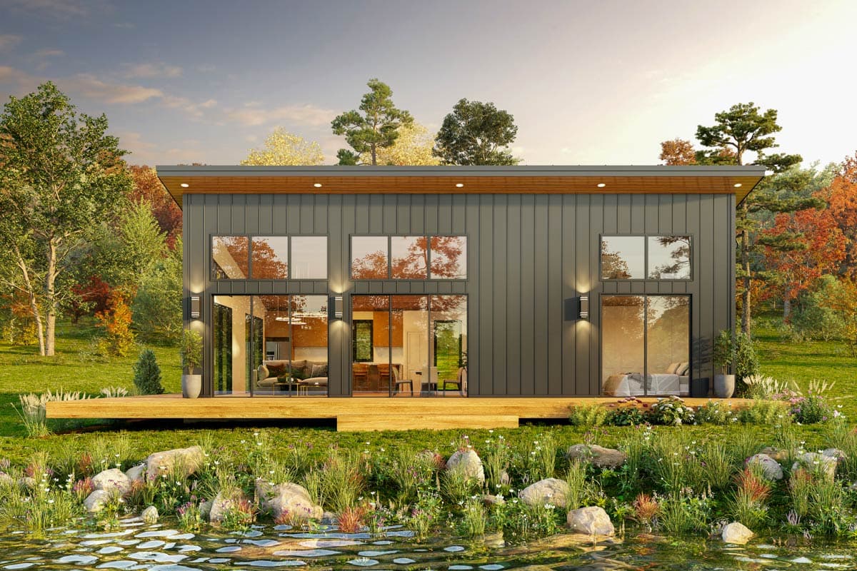 House plan exterior. Modern style, one story. Features include a flat roof, large windows, and a raised wooden deck.