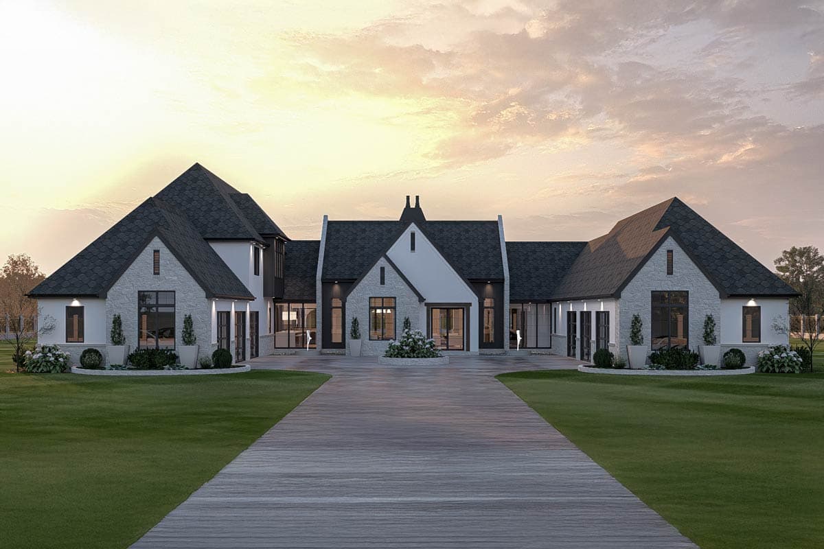 House plan exterior featuring a two-story design with multiple gables, stone veneer, and a long driveway approach.