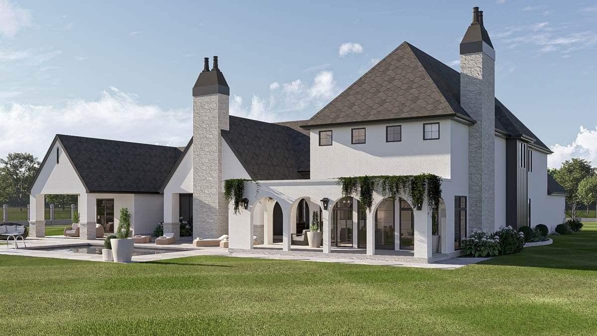 House plan exterior: White stucco house with gabled rooflines, stone chimney, arched loggia, and rear pool area.