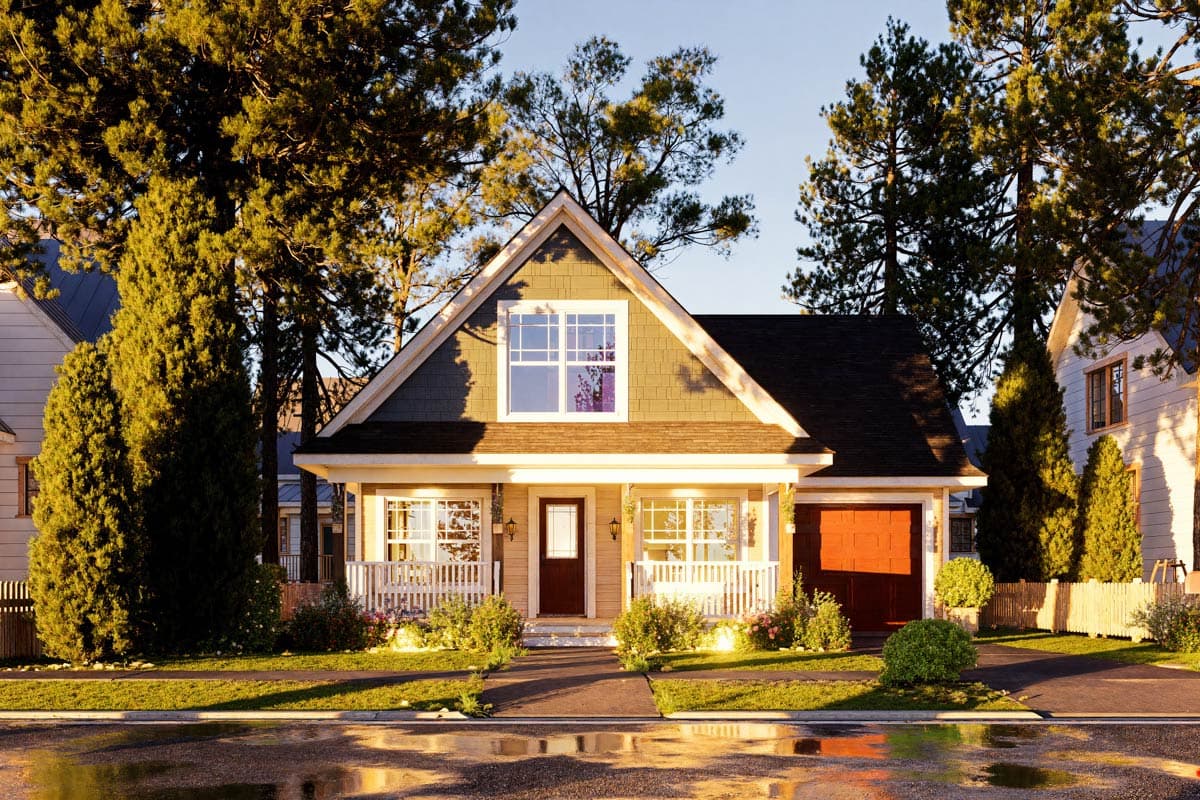 House plan exterior: Two-story modern farmhouse with front porch, gabled dormer, and side-facing garage.