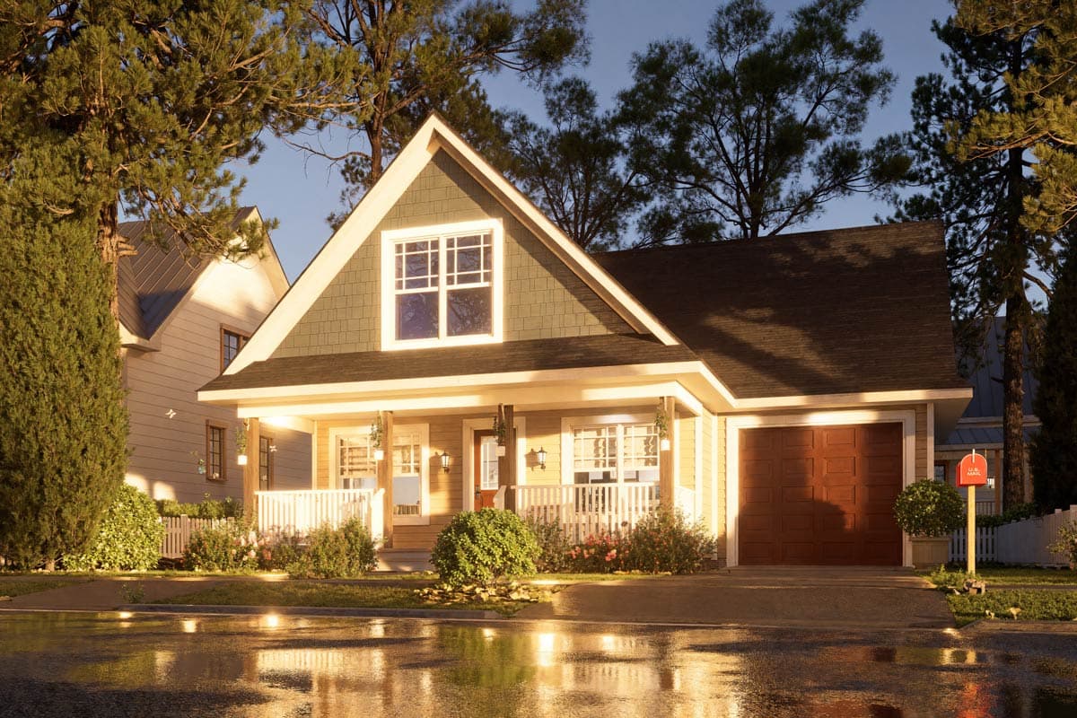 Craftsman style house plan exterior with a covered front porch, prominent gables, and a single-car garage.