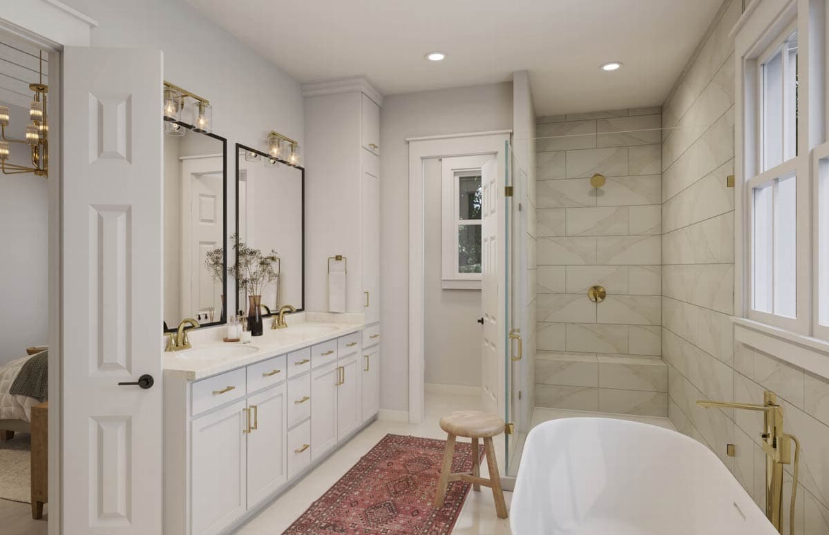 Luxurious bathroom with a double vanity, large mirrors, a walk-in shower, and a freestanding bathtub with gold fixtures.
