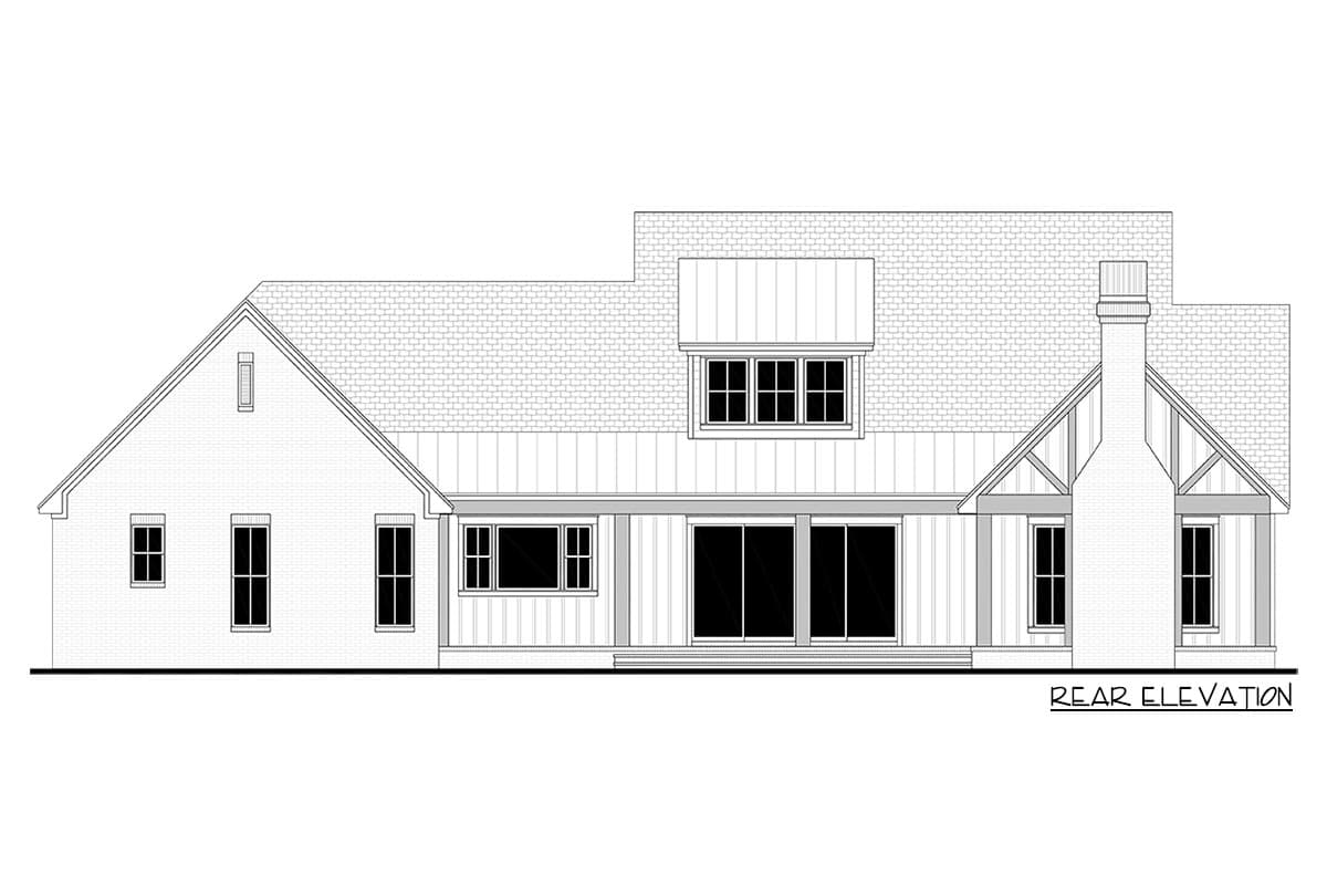 Rear elevation of a house, black and white line drawing. Features various roof lines, windows, and a chimney.
