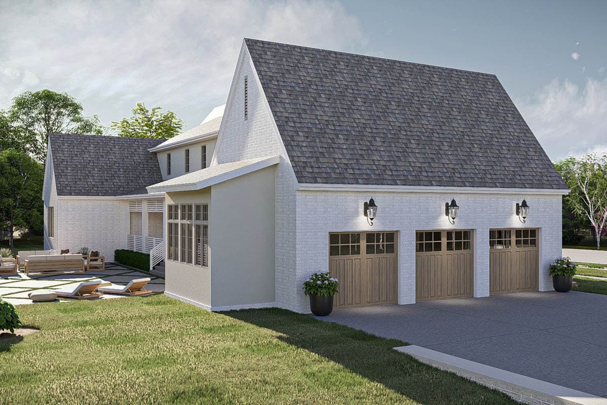 House plan exterior: Two-story home with white brick, triple garage doors, gable roof, and sunroom extension.