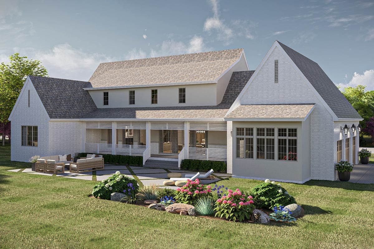 House plan exterior: Modern Farmhouse style, two stories, with a wraparound porch, multiple gables, and a three-car garage.