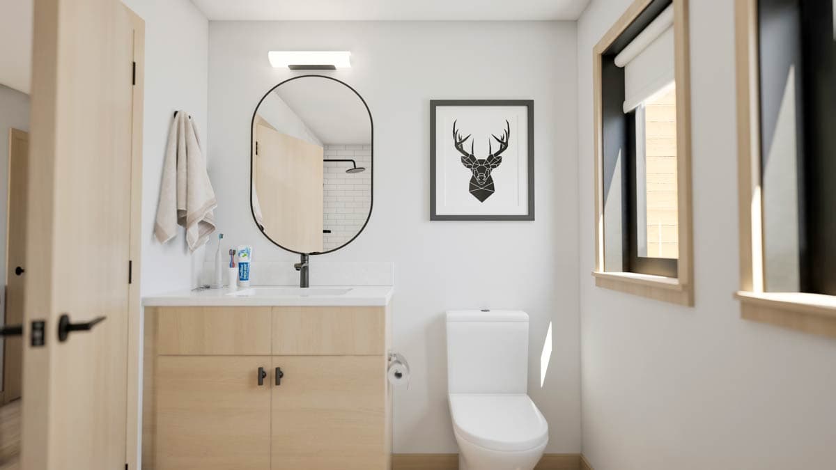Bathroom interior rendering with wood vanity, oval mirror, toilet, and framed deer art. Window on right wall.