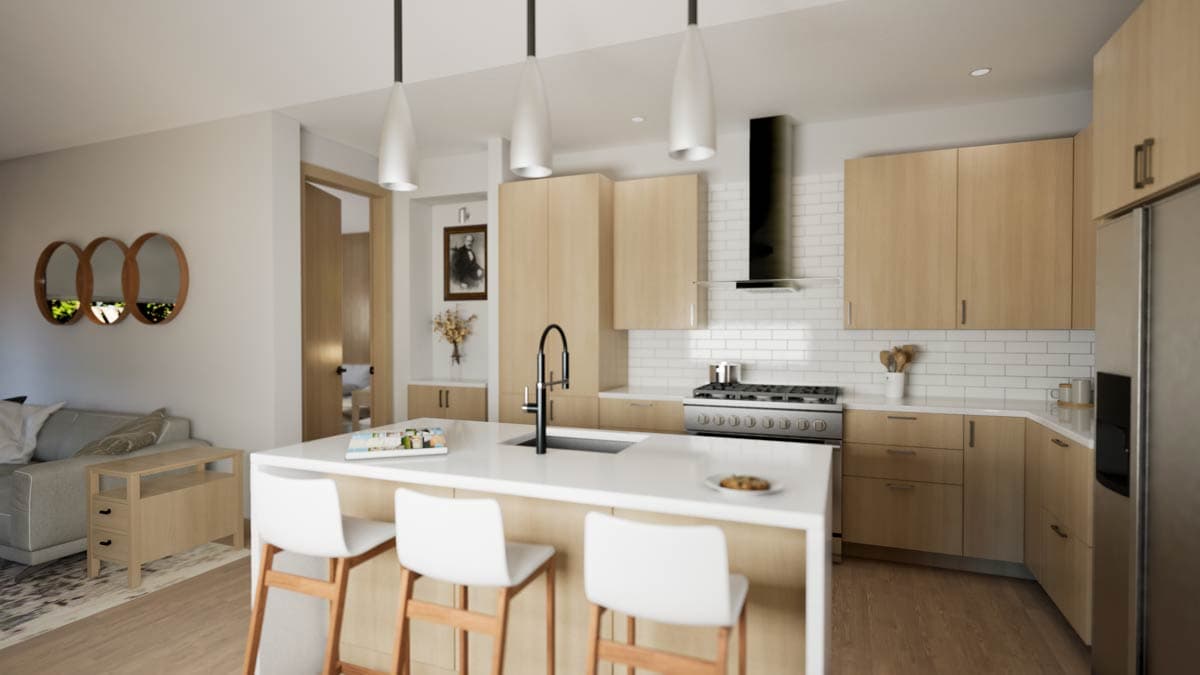Contemporary kitchen with island, light wood cabinetry, white subway tile backsplash, and stainless steel appliances.
