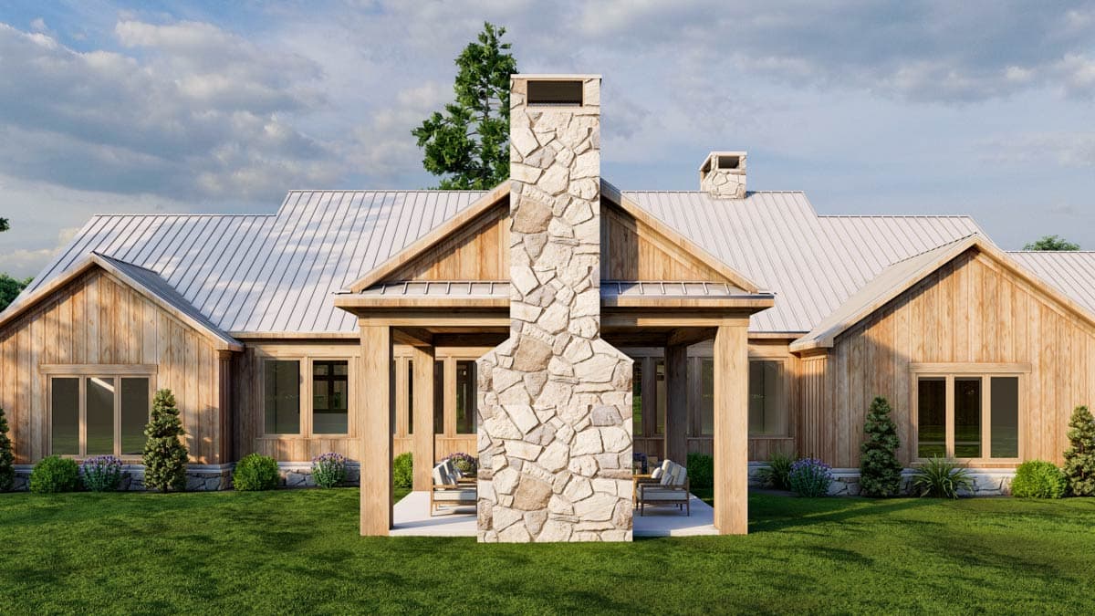 House plan exterior rendering of a Modern Farmhouse with wood siding, metal roof, and prominent stone chimney.