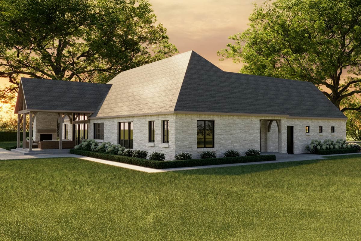 Architectural rendering of a modern house. Features stone facade, gabled roof, and outdoor patio.