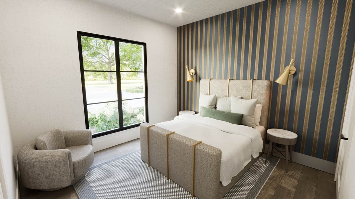 Modern bedroom with a large window, striped accent wall, upholstered bed, armchair, and gold sconces.