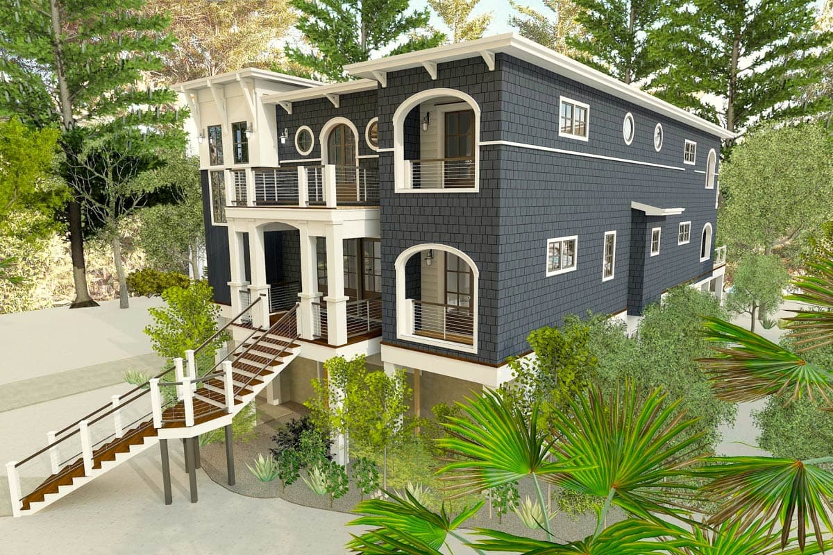 House plan exterior: Two-story house with dark gray shingle siding, arched windows, balconies, and a prominent outdoor staircase.