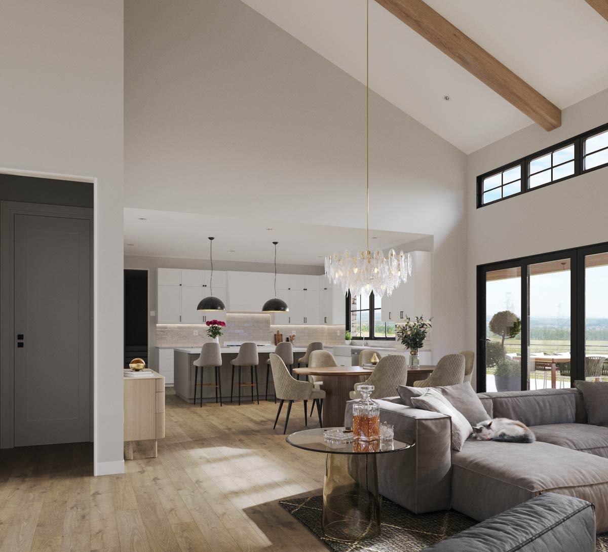Open concept living space with vaulted ceilings, exposed beams, a kitchen island, and large windows.
