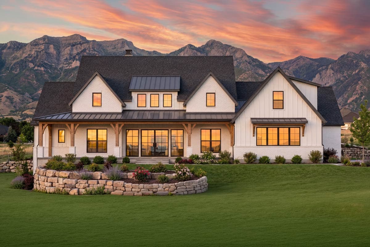 Modern Farmhouse house plan exterior, two stories, white brick, board and batten siding, gables, dormers, and a covered porch.