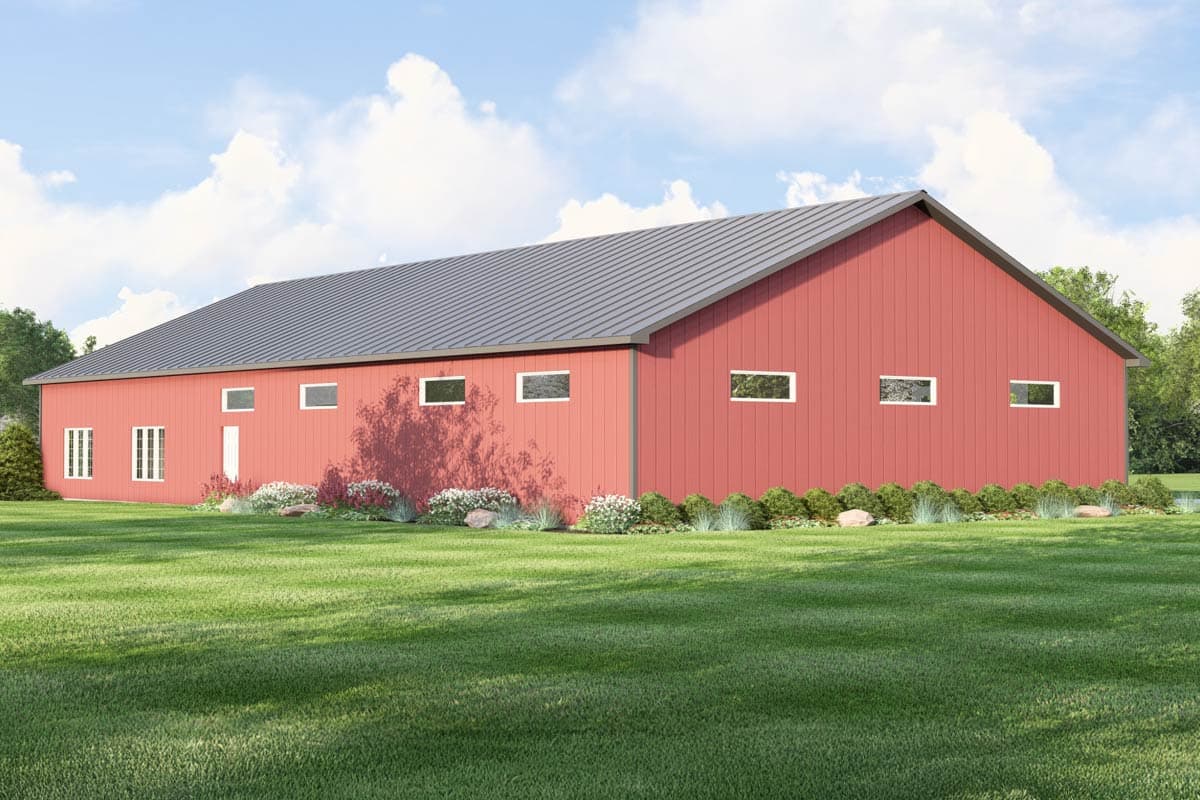 House plan exterior of a long, one-story red building with a gabled metal roof and multiple rectangular windows.