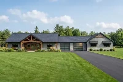 Modern Barndominium with Expansive Porches and Workshop