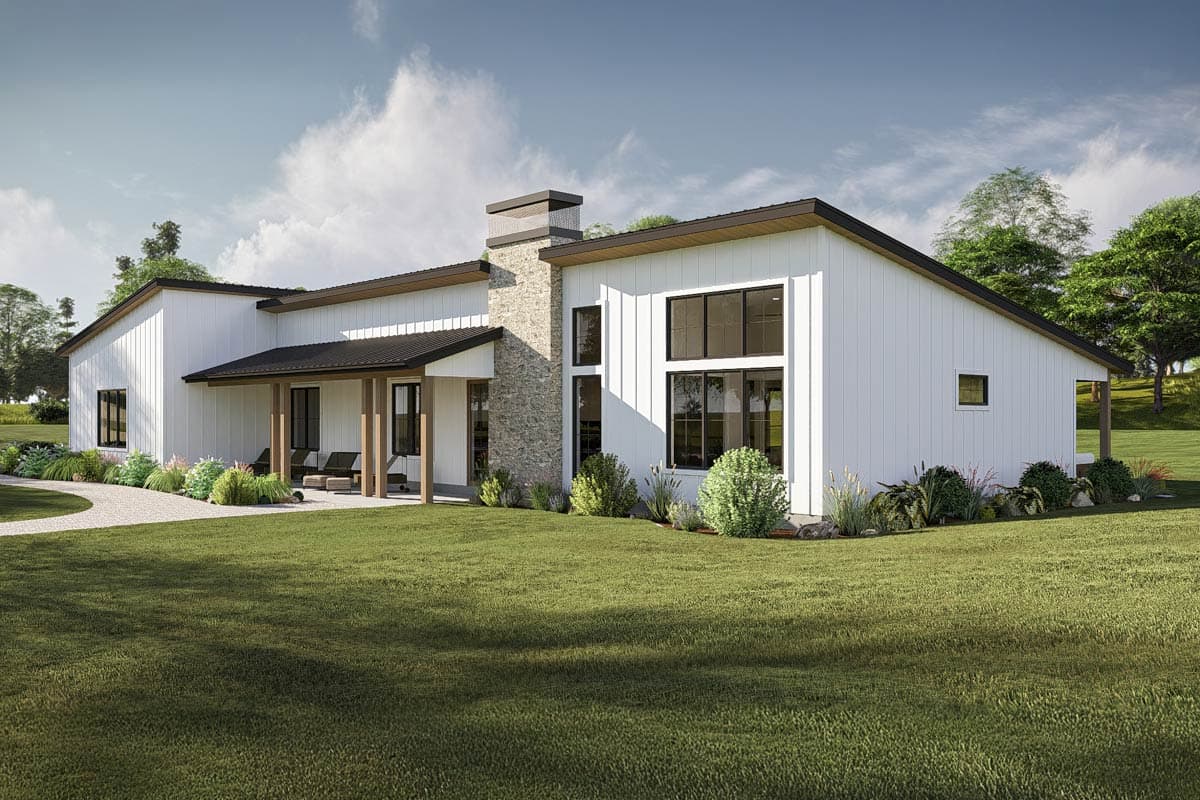 Modern ranch house plan exterior with white vertical siding, stone chimney, covered porch, and large windows.